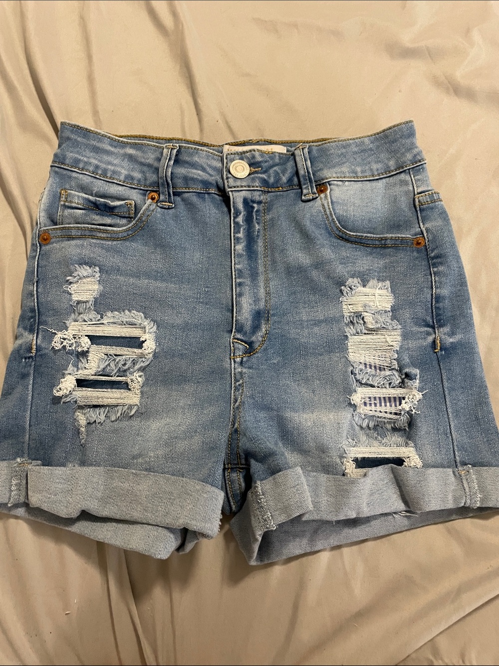 Women’s Light Blue Distressed Denim Shorts